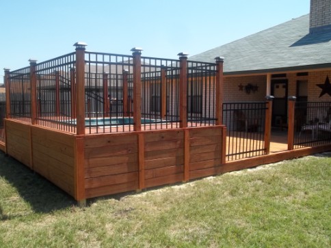 Redwood Stain on treated White Pine, Hot Tub Inset, Metal rails, Solar Lighting.